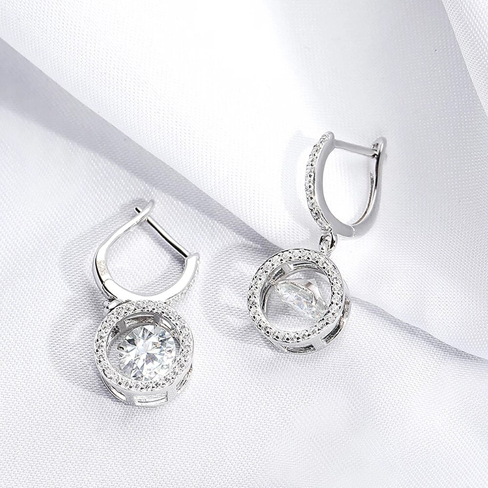 Dancing Radiance - Drop Earrings in White Gold